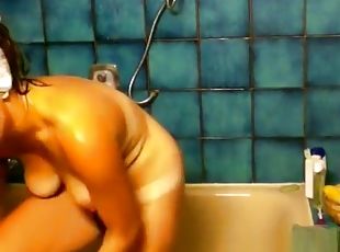 Hidden cameraman in shower admiring amateur booty
