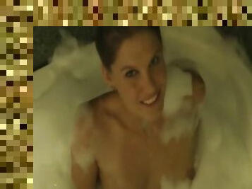 Soapy chick Jody Love poses in the bath