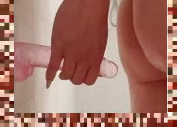 Shower play session with pink dildo
