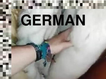 German boy playing with fur