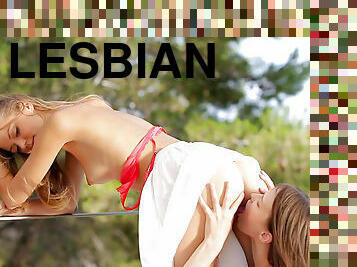 Sexy lesbians enjoying outdoor oral