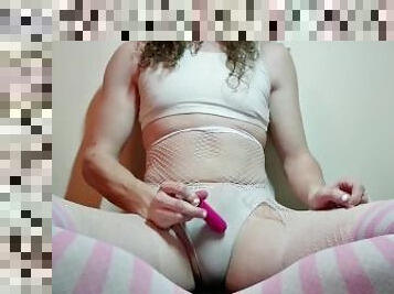 Femboy Stroking Her Cock With A Vibrator In White Fishnets