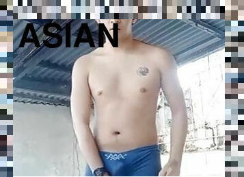 Asian teen boy masturbates on a grave