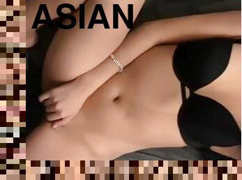 Asian masturbates