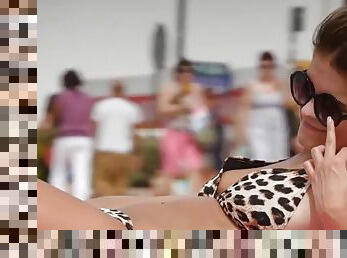 Leopard print bikinis on girls at the beach