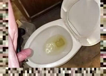 Grown man pissing after along day at work