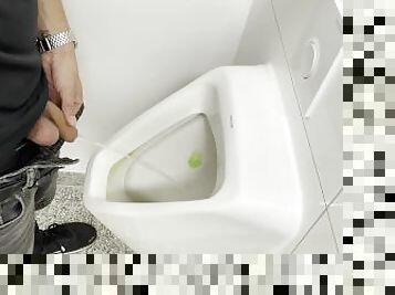 Playing with piss in the toilet