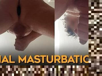 Anal masturbating with a plug