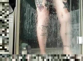 Tatoo girl in shower naked