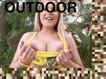 Darcy tyler shows off her huge fake tits outdoor
