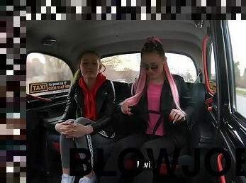 Two rebellious twins having fun with their taxi driver