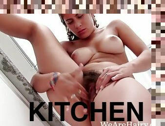 Dripping wet sally masturbates in her kitchen