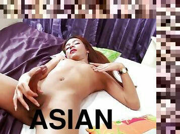 Alluring asian brunette tgirl meen enjoys solo masturbation