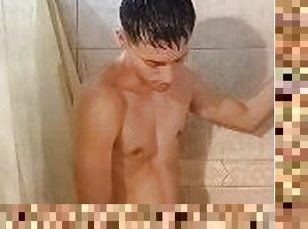 Young masturbates in the shower