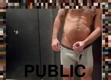 Jock jerks cock in gym locker room after workout