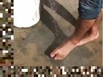 Beach Feet, washing sand off