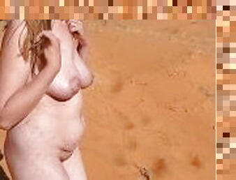Plying at the dunes naked