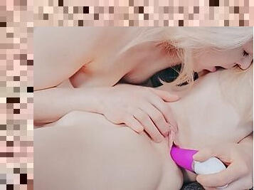 Playful cuties lick and suck a sex toy as foreplay