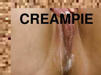 Girl rubs her extremely creamy wet pussy