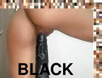 18 years old riding black dildo until it comes