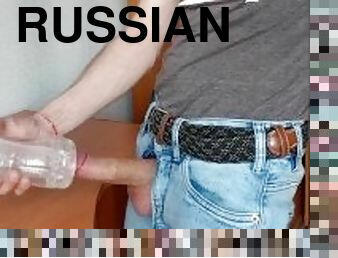 Fit Russian guy in jeans fucks an artificial vagina and cums on the table
