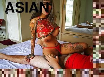Asian Babe Riding A Big White Cock
