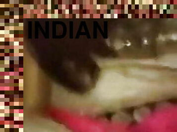 Indian girl in red saaree enjoying her party night