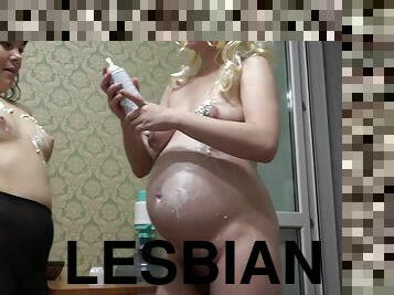 Lesbian licking cream from pregnant milf, fetish foreplay with food.