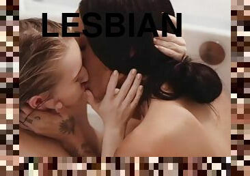 Lesbians bathing in the bathtub want to lick their pussies