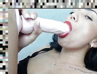 Sexy girl deep throating a dildo