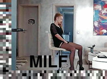Gorgeous MILF in high heels uses a big black dildo