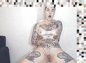 Tattooed short haired student with long pussy lips