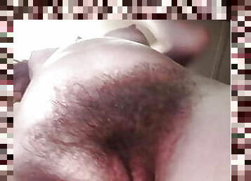 Mom with saggy tits plays with her hairy bush