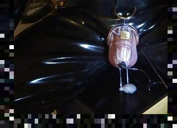 Estim cum milking with chastity device