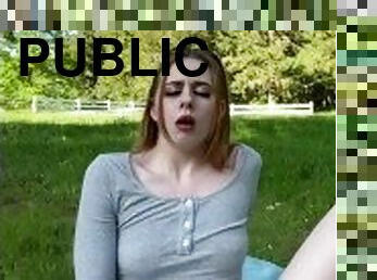 Ginger teen cums in a public park and then sucks juices off her dildo