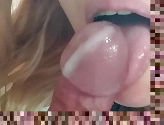 She licks my cock gently with her tongue until I cum in her mouth