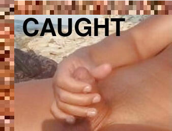 cock handjob on wild beach