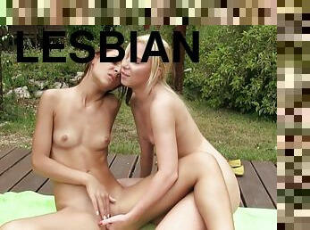 Sensual young lesbians share romantic nude oral in outdoor scenes