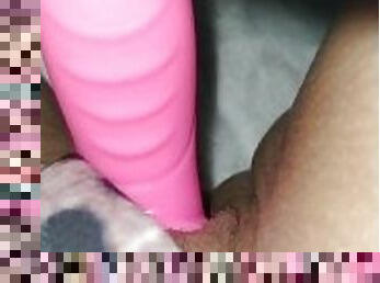 Slutty teen plays with hot pink toy