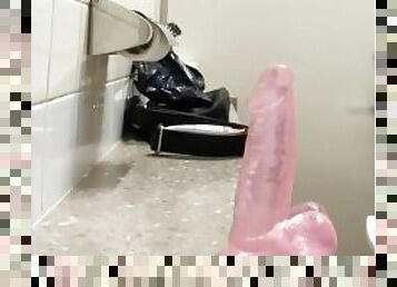 Dildo in anal in public toilet