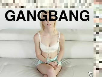 Petite blonde girl makes her first gangbang