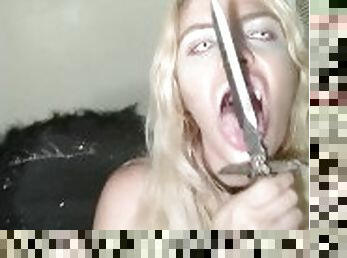 succubus teases herself with a ceremonial dagger and fucks blade side