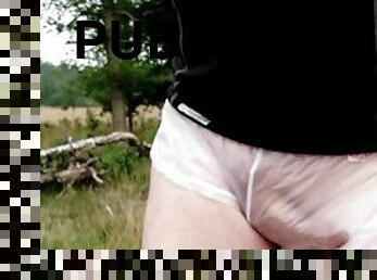 Public forest run in transparent shorts