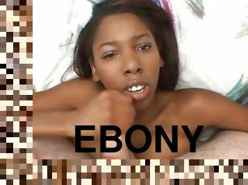Ebony teen deepthroats hard white cock