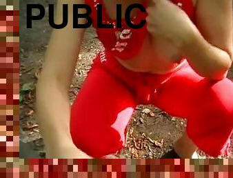 Public masturbation of her husband in park and showing her tits there.
