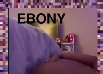 Fat ebony fuck dildo on the side of the bed
