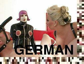 2 Male Slaves And German Domme