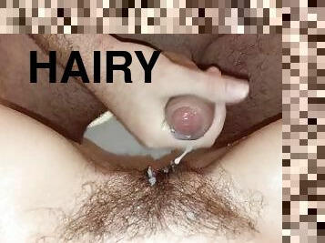 I jerk off my dick on my hairy pussy and cum. Cum on hairy pussy.