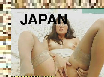 Japanese MILF Rubs Her Pussy