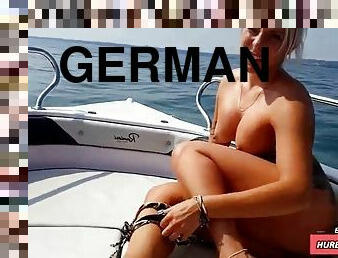 GERMAN MILF IN FUCKS ON THE SEA BOOTS